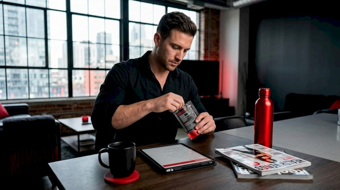 Man using discreet energy supplement at kitchen table